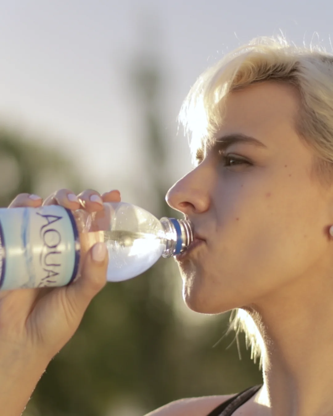 runner tomando agua aqualic vertical